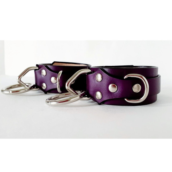purple bdsm cuffs.png