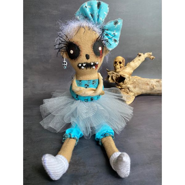 Halloween doll in blue dress