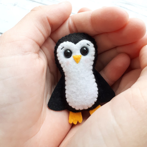 Penguin-plush-pocket-hug
