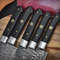 set of damascus kitchen knives.jpg