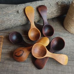 Handmade wooden scoop from natural aspen wood for ground coffee or sugar