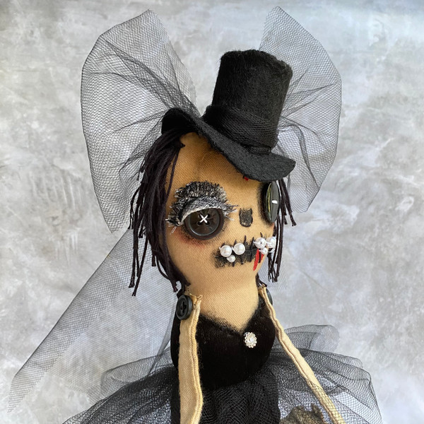 Goth doll , Creepy Doll .