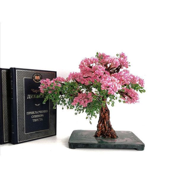 artificial-Azalea-tree-bonsai-pink-on-white-background-with-books.jpg
