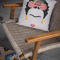 mockup-of-a-square-pillow-placed-on-an-armchair-in-a-lounge-23552 (1).png
