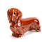 statuette red Longhaired Dachshund
