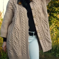 Knitted cardigan.Beige hand-knitted wool jacket for women.