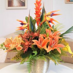 artificial tropical arrangement, orchid and lily centerpiece,  faux flowers arrangement in tropical style, table decor