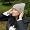Beige_womens_warm_hand-knitted_hat_2