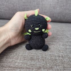 Crocheted black dragon. Miniature handmade dragon toy.