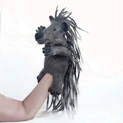 Porcupine wool puppet on the hand for the puppet theater. A unique toy to order.