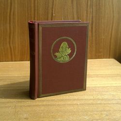 Lewis Carroll. Alice in Wonderland.  A small real book. Styling for the first edition.