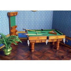 Billiard table. Pool table. Wooden billiard table and billiard cue rack. Dollhouse miniature. Scale 1:12.