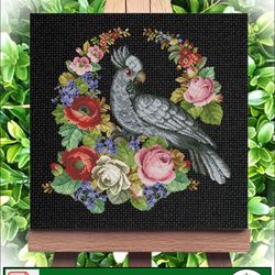 Vintage Cross Stitch Scheme Black cockatoo. Flower cross stitch.
