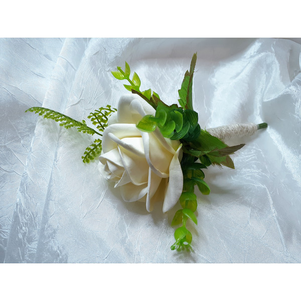 White-rose-wedding-boutonniere-1.jpg