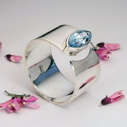 Silver ring with topaz.
