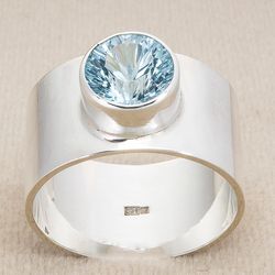 Silver ring with topaz.