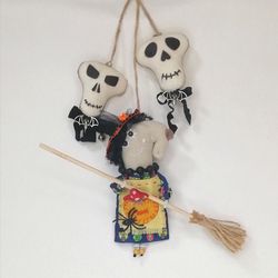 Halloween door decorations, kitchen witch and skull ornaments