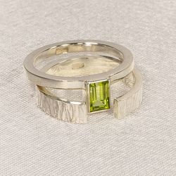Silver ring with peridot.