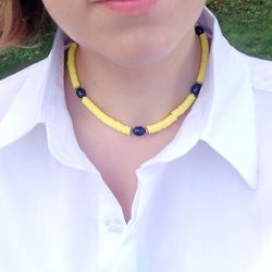 Yellow Necklace and with rubber beads and pearls .