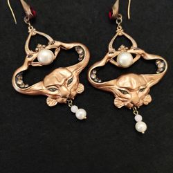 Custom Art Nouveau Symbolist earrings crowned with two snakes