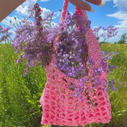 Handmade bag made in pink of raffia