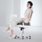Ergonomic hip support pillow on office chair for back pain relief