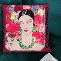 Embroidered decorative pillowcase in marsala color "A woman with beads in a rose garden". Drawing from a vintage cover