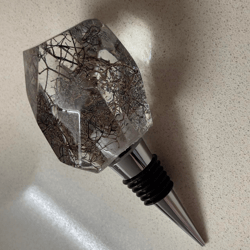 resin wine bottle stopper with embedded dried australian queen anne's lace flower skeleton