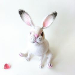 Realistic rabbit. Funny bunny. Rabbit soft toy. Animal plush toy bunny. Stuffed figurine rabbit. Amigurumi crochet bunny