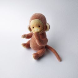 orange monkey plush toy