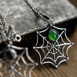One sterling silver green stone pendant. Halloween necklace. Spiderweb