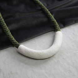 White U shape necklace with green cord, polymer clay and cotton contemporary jewelry