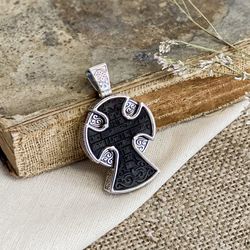 Silver cross with a handmade ebony insert is an author's cross