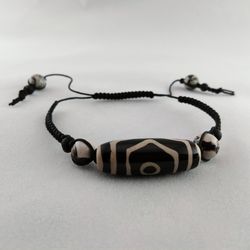 Shamballa bracelet with DZI bead from Agate, Jasper, and Shungite.