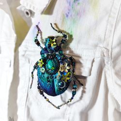 Blue embroidered beetle with pearls, the head is embroidered separately