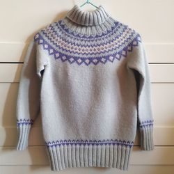 Wool knitted sweater for a girl or a boy