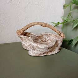 vintage bowl with wooden handle made of handmade papier-mache. interior bowl.
