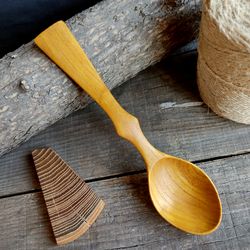 Handmade wooden spoon from natural mulberry wood with elegant handle for eating