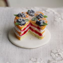 Miniature naked cake with oranges and berries, dollhouse food at 1:12 scale