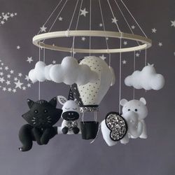 Unisex monochrome baby mobile, contrasting black and white  balloon with soaring clouds