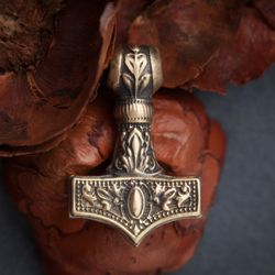 Thor Hammer pendant with floral ornament on leather cord. Pagan Viking necklace. Handcrafted Scandinavian jewelry.