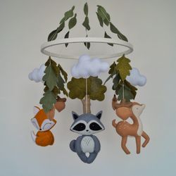 Forest animal mobile for woodland nursery. Fox, Bambi, Raccoon and Hare around the oak tree