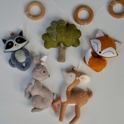 Play gym activity toys. Hanging forest creatures toy for nursery.