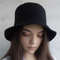 Stylish, fashion black bucket hat for women. Luxury designer hat made of unisex cotton. A mod handmade bucket  hat.
