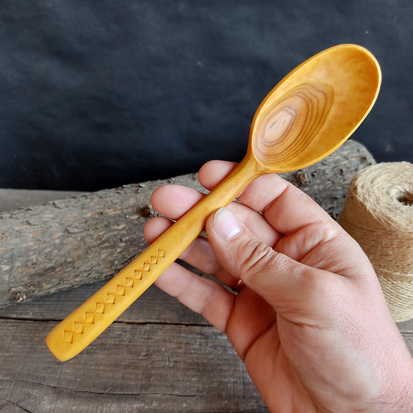 Handmade wooden spoon from natural apricot wood with decorated handle - 01