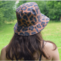 Summer cotton bucket hat with leopard cheetah print. Fashion designer safari hat. Cute bucket hat with an animal print.