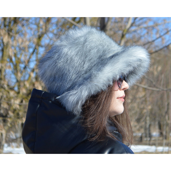 Silvery white arctic fox fur hat. Faux fur bucket hat. Furry bucket hat. Fluffy hat made of blue fox fur. Cute fuzzy hat