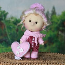 Fabric doll Baby in a pink jumpsuit. Interior doll. Ready to ship doll