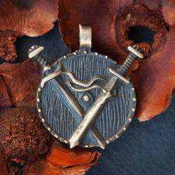 Brass crossed swords on a shield pendant on leather cord. Warrior handcrafted necklace. weapon jewelry. Present for man.