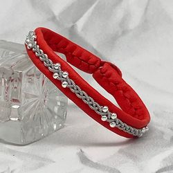 Female Sami leather bracelet with silver beads. A narrow braided bracelet for a woman. Scandinavian-style jewelry.